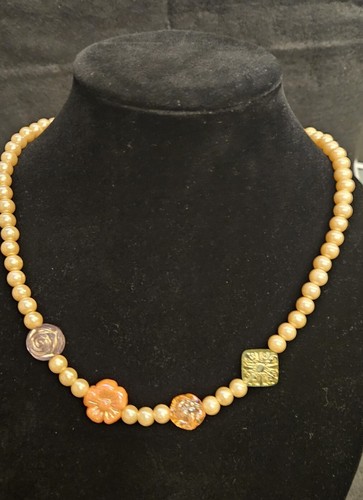 Collana perle avorio con - di,